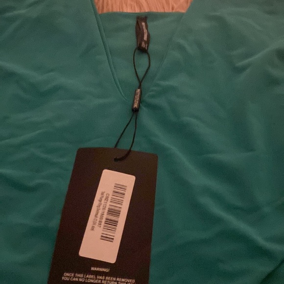 Beautiful deep v cut gold ring on shoulder one piece bathing suit… - Picture 7 of 7